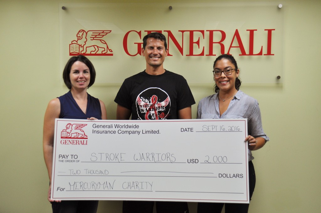 Stroke Warriors representative William Foster (centre) receives the proceeds of the 2016 Mercuryman from Mercuryman Race Director Claire Griffin (L) and Karen Ebanks, Marketing Manager at Generali Worldwide (R)